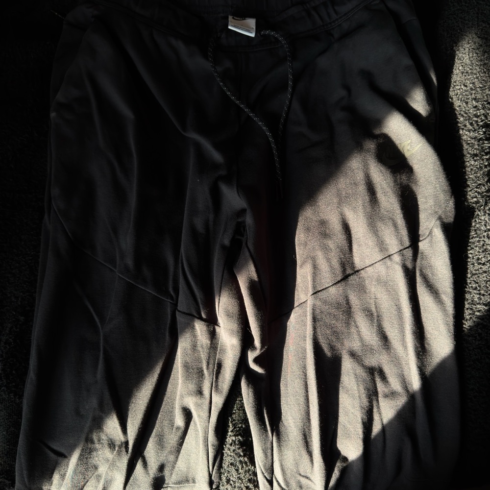NikeTech Black Jogger Pants
